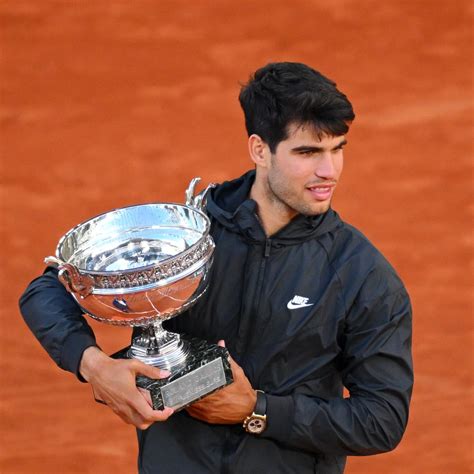 The Joyful Climb of French Open Winner Carlos Alcaraz .
